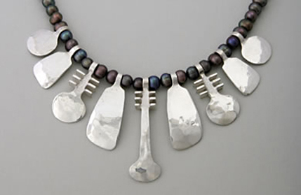 Small Symbol necklace on dark grey fresh-water Pearls